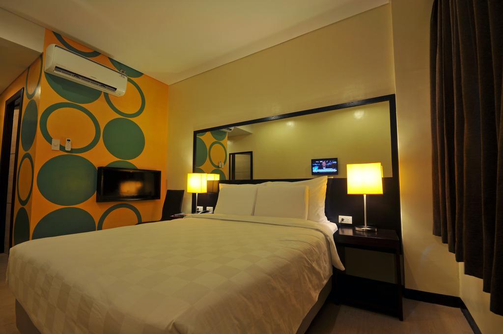 Go Hotels Puerto Princesa Kamer foto
