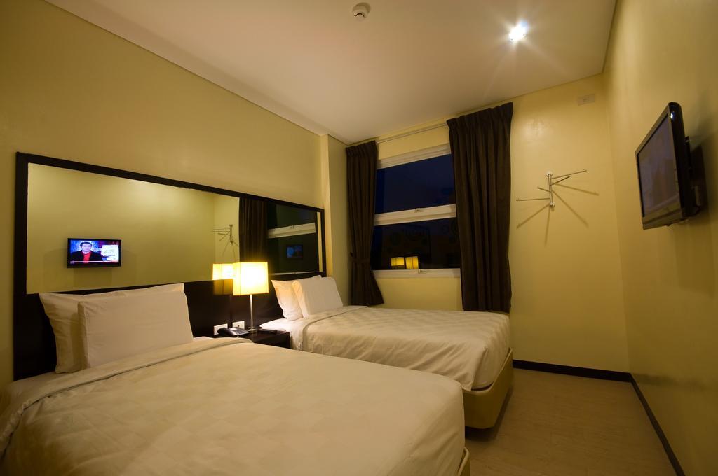 Go Hotels Puerto Princesa Kamer foto