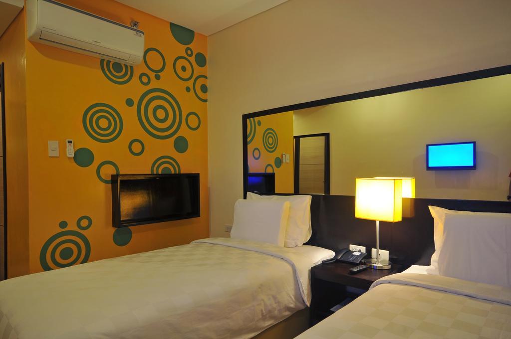 Go Hotels Puerto Princesa Kamer foto