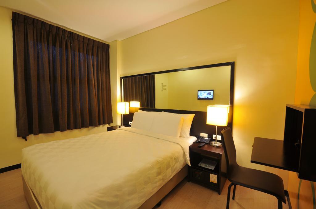 Go Hotels Puerto Princesa Kamer foto